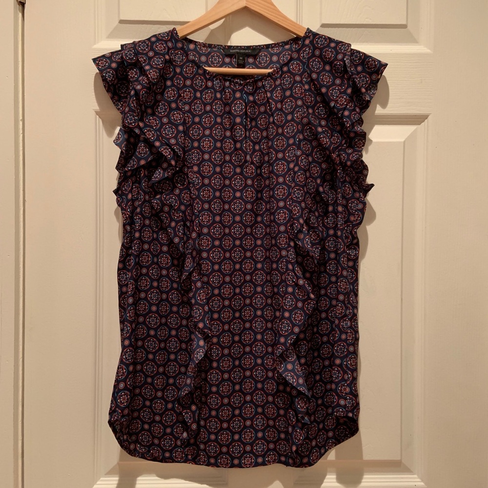 Navy blue patterned sleeveless blouse
